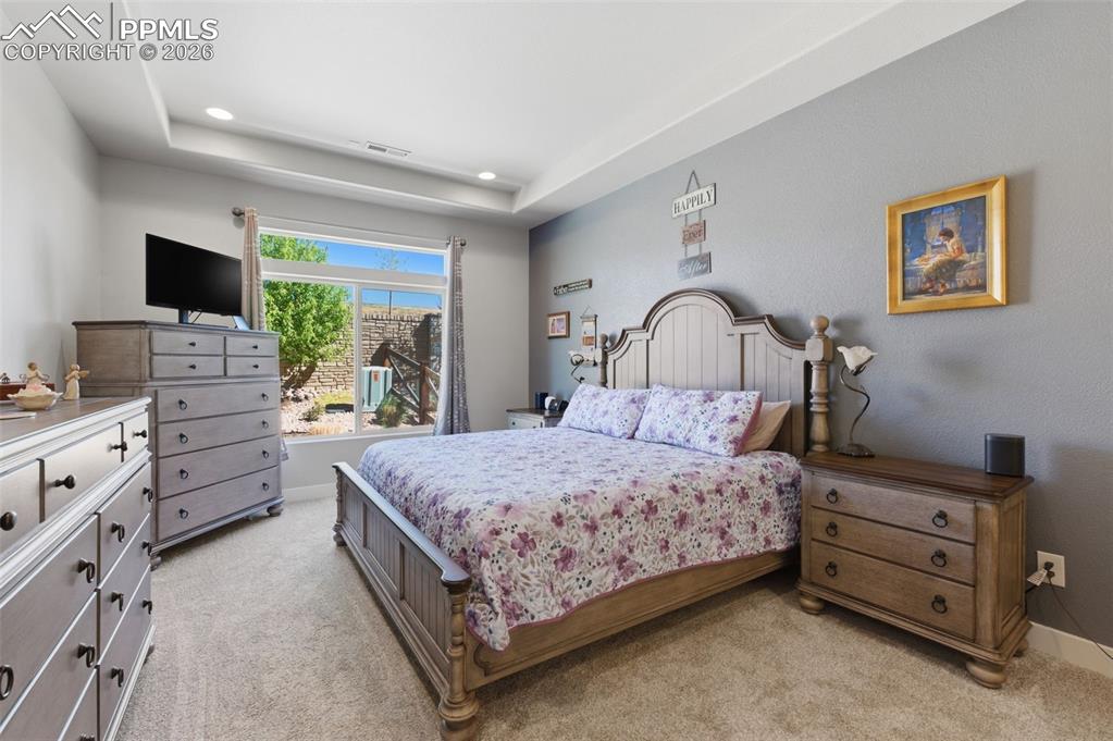 Image 14 of 36: Primary Bedroom with natural light