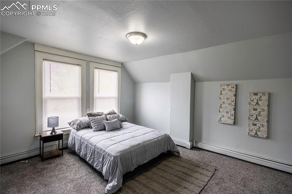 Image 12 of 21: Bedroom