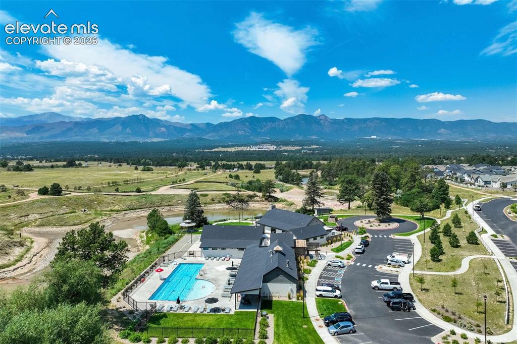 Image 49 of 50: Community clubhouse featuring an outdoor swimming pool, spa, and sundeck