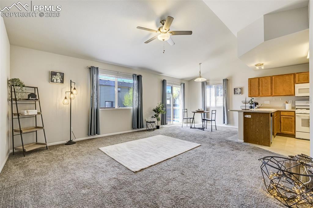 Image 5 of 33: Living and dining area with lots of natural light!