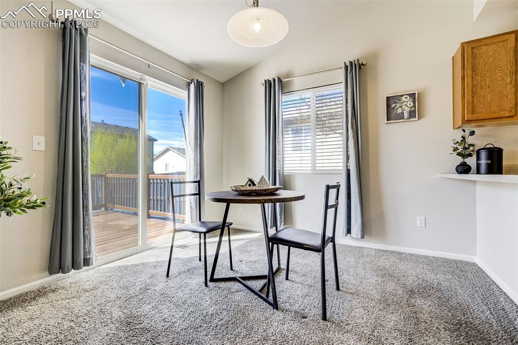 Image 7 of 33: Dining right off the kitchen is perfect for entertaining.