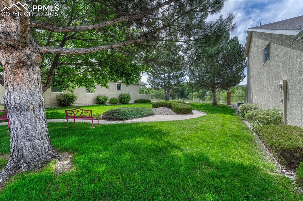 Image 42 of 47: Green space next to the home gives you another place to enjoy the outdoors