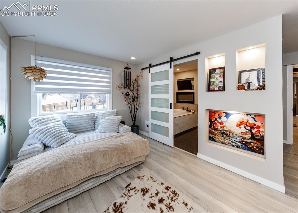 Image 43 of 50: Sitting Area second Primary Bedroom Basement