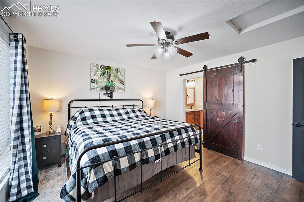 Image 23 of 50: primary bedroom upper level