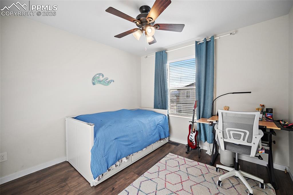 Image 32 of 50: upper level secondary bedroom