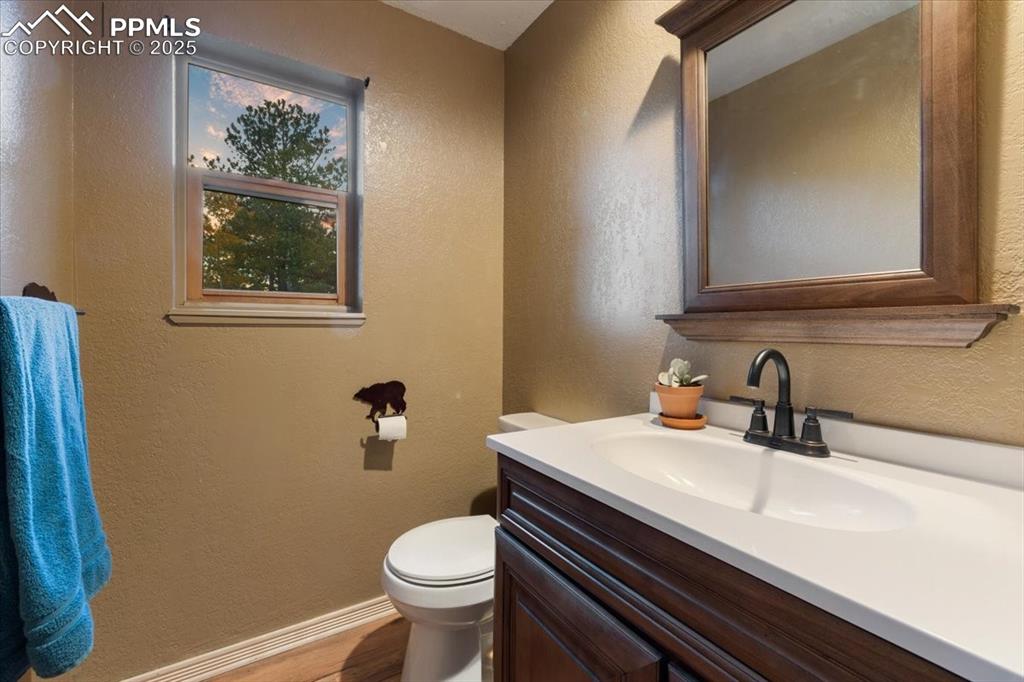 Image 24 of 47: Main floor half bath