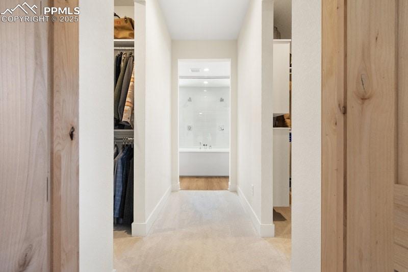 Image 25 of 49: Hallway featuring carpet, baseboards, and recessed lighting