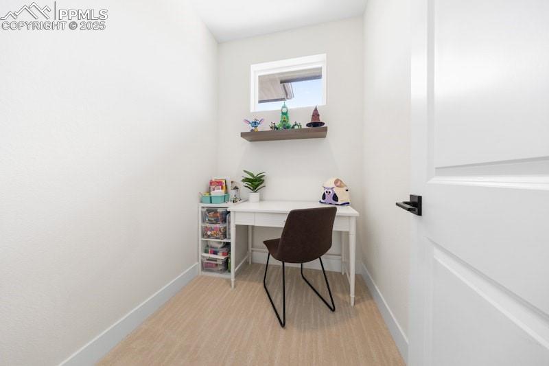 Image 38 of 49: Home office with baseboards
