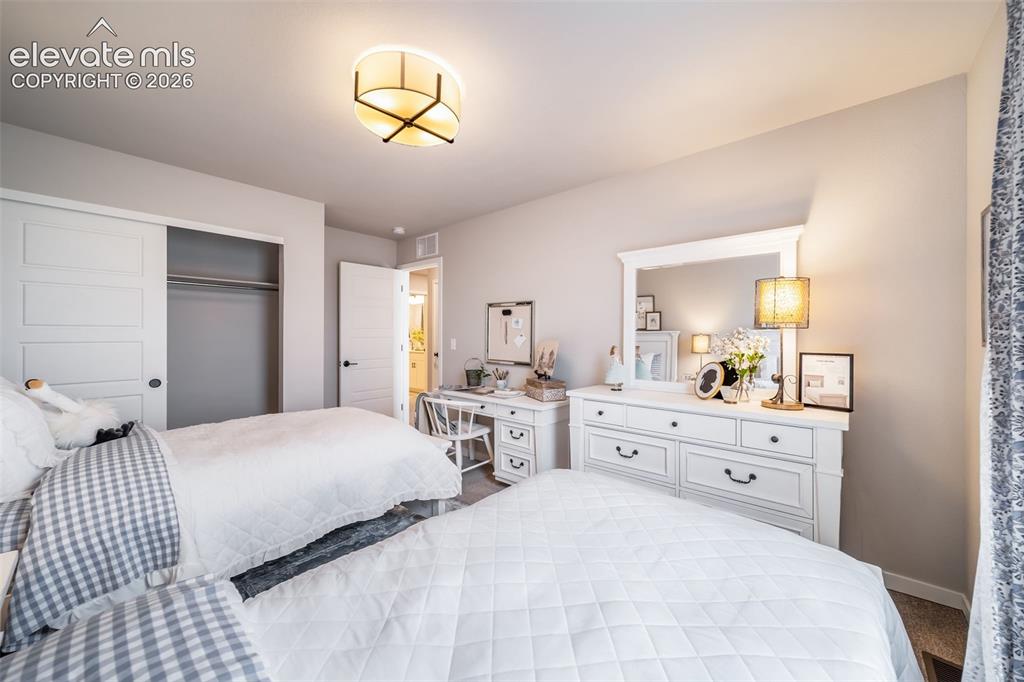 Image 10 of 45: Bright bedroom featuring neutral wall tones
*Photos of a model home*