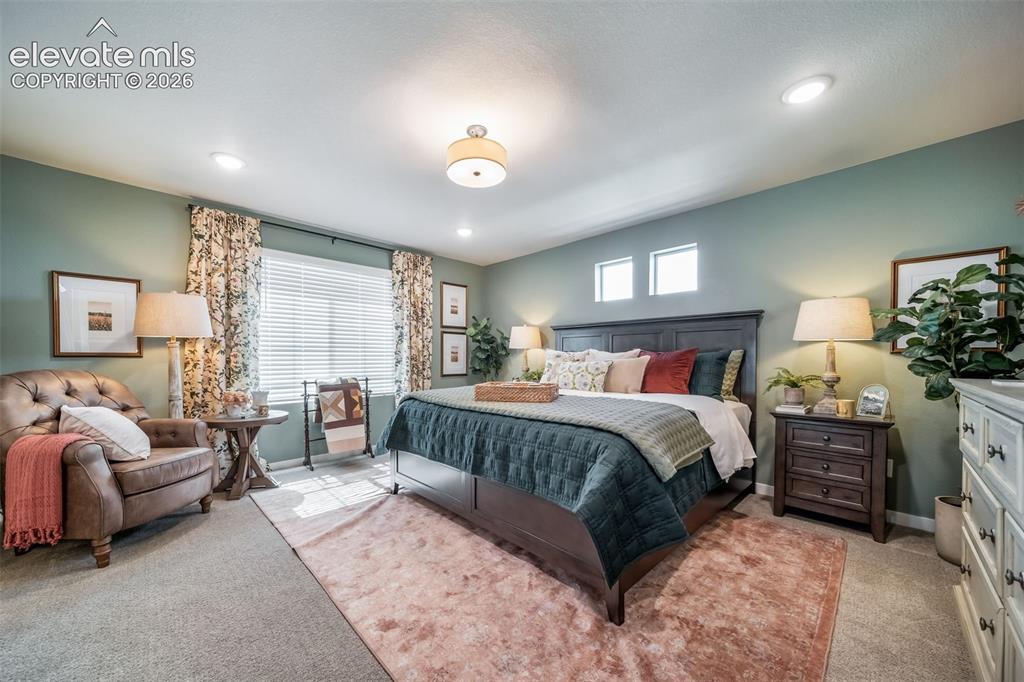 Image 41 of 45: Carpeted room featuring recessed lighting, a ceiling-mounted light fixture,