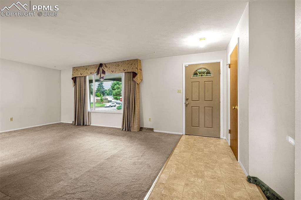 Image 5 of 19: An alternate view of living room space.