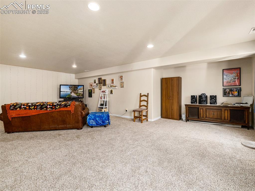 Image 24 of 48: Game room featuring recessed lighting and carpet floors