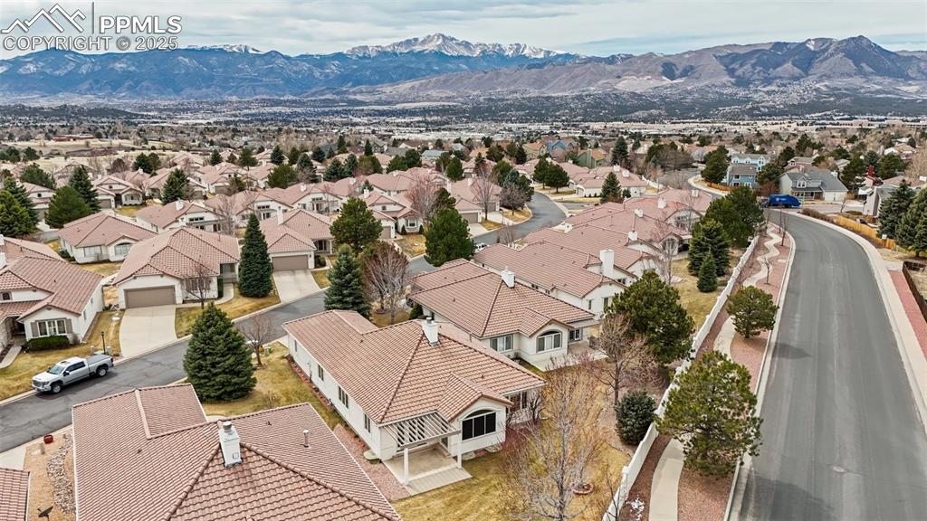 Image 35 of 49: Aerial view with a residential view and a mountain view
