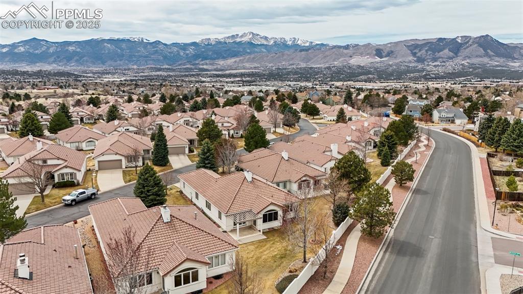 Image 37 of 49: Drone / aerial view featuring a mountain view and a residential view