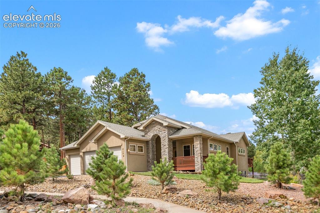 Caption: Front of property.  Beautifully landscaped. 