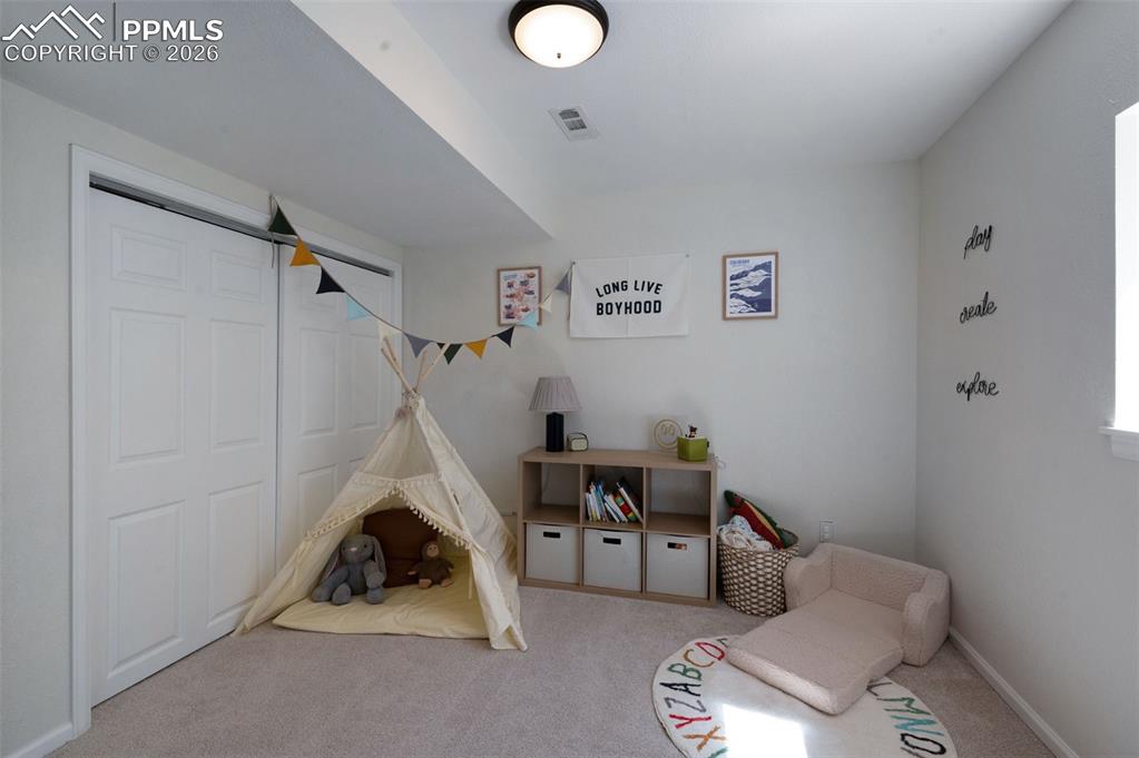 Image 27 of 38: Bedroom