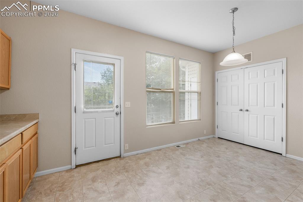 Image 19 of 38: Unfurnished dining area featuring healthy amount of natural light