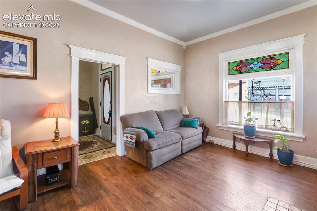 Image 10 of 43: from the living room, looking back into the Foyer or Piano Room