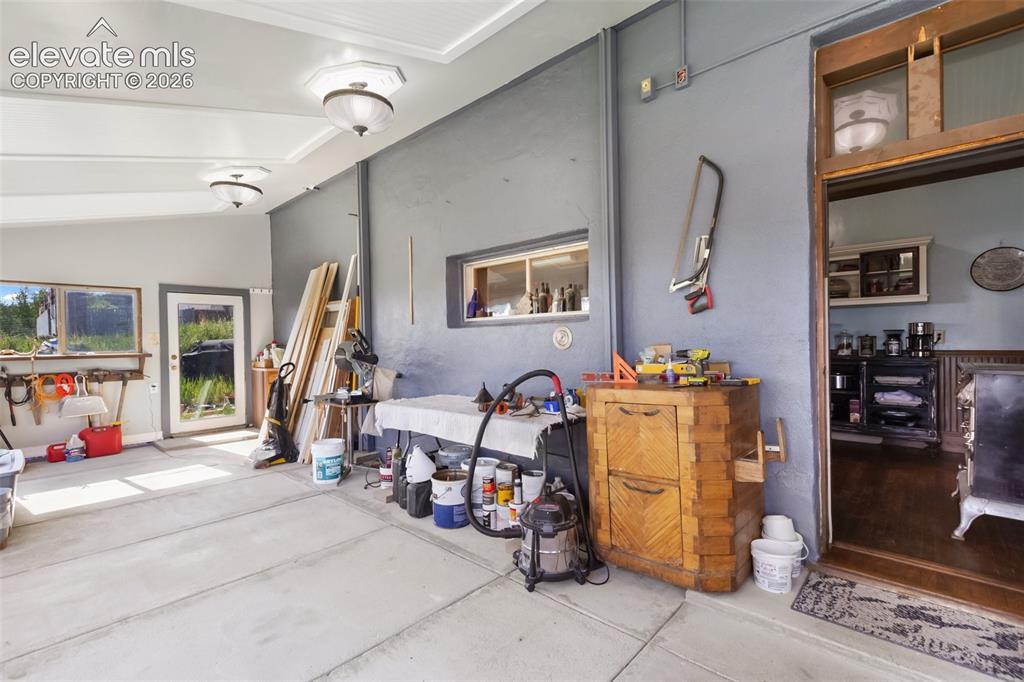 Image 27 of 43: solarium looking from the east to the west, door on the west end directly a