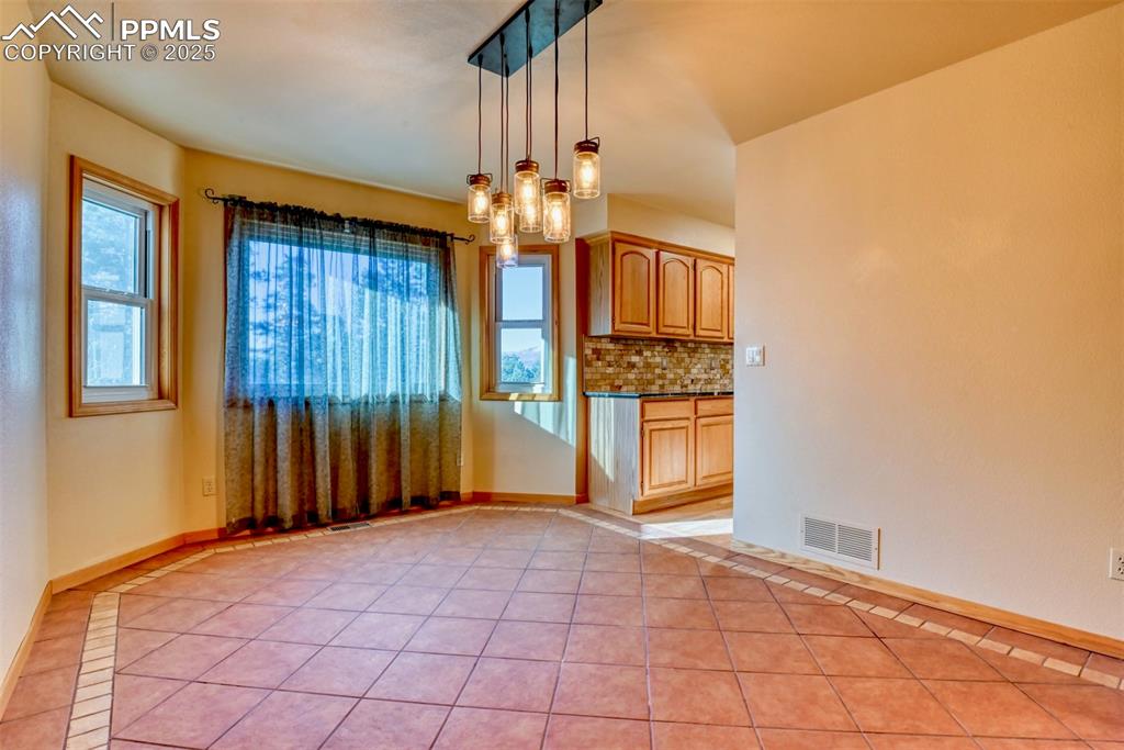 Image 10 of 23: A large wonderful dining space for holiday meals