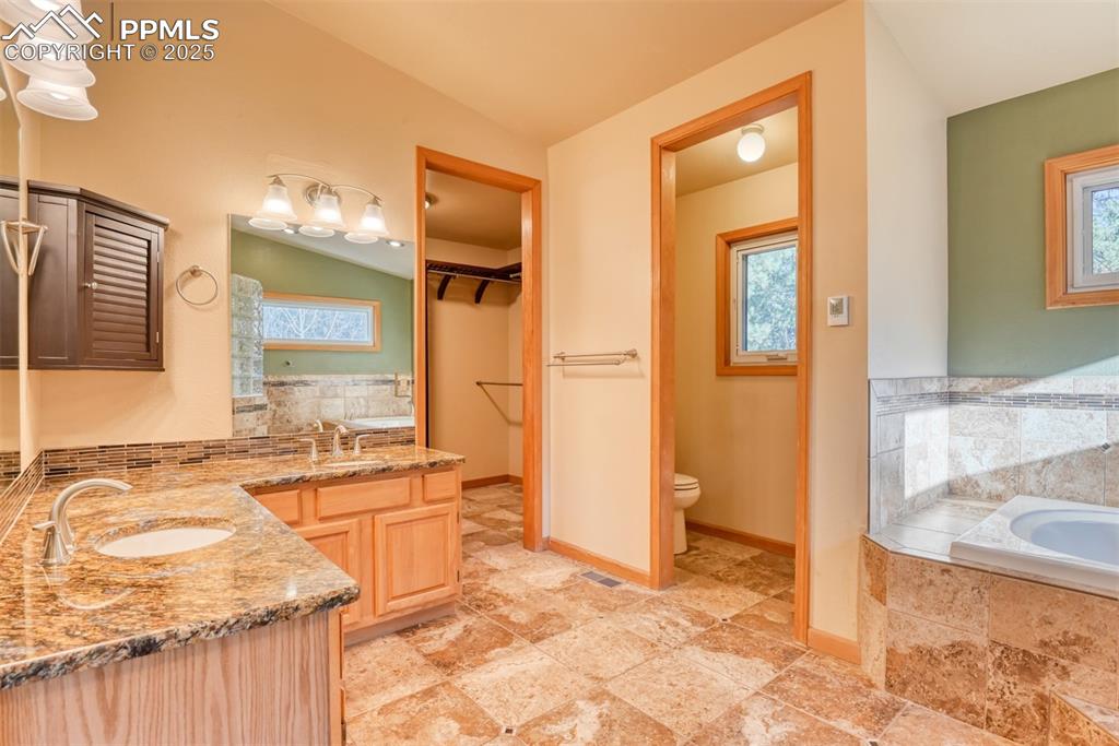 Image 7 of 23: Spacious Master bath with heated flooring and the best shower ever