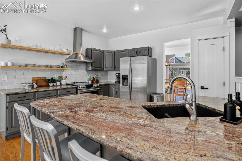 Image 16 of 47: Large bar for casual dining, added 8 new electrical outlets and cover plate