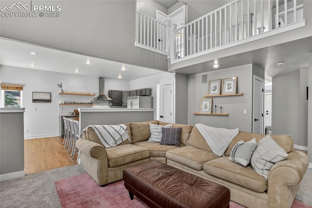 Image 20 of 47: This fresh space has lots of light pristine flooring, paint, doors and more