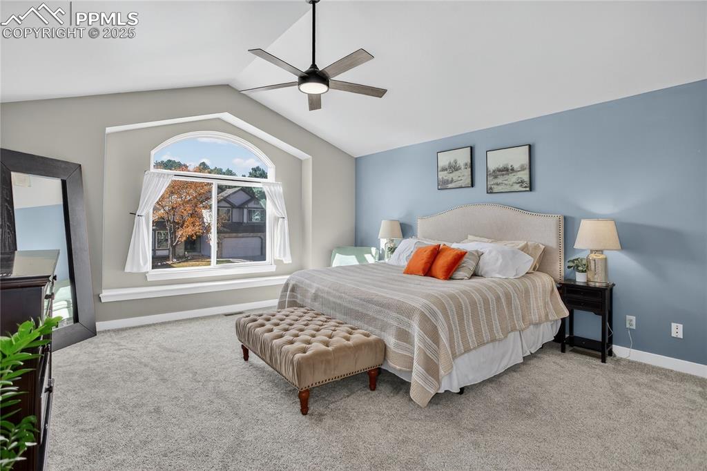 Image 27 of 47: Large primary with views, vaulted ceilings