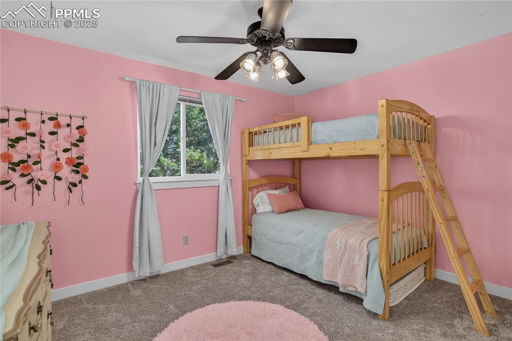 Image 32 of 47: 2nd spacious bedroom on 2nd level that has new doors, trim, paint and carpe