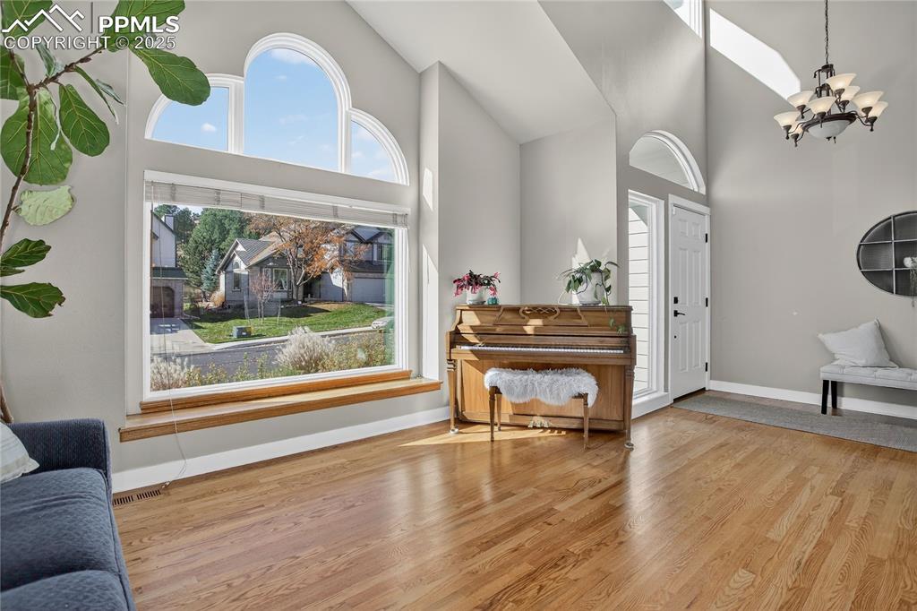 Image 7 of 47: Large picture windows allowing plenty of natural light, entryway closet for