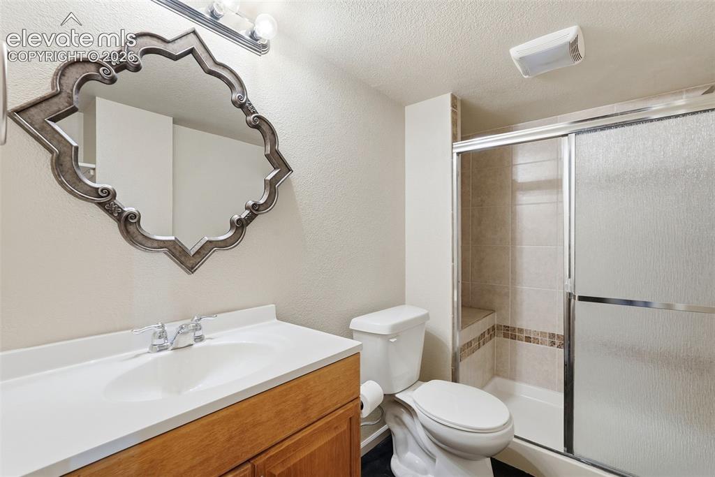 Image 26 of 33: Full Bathroom in Basement