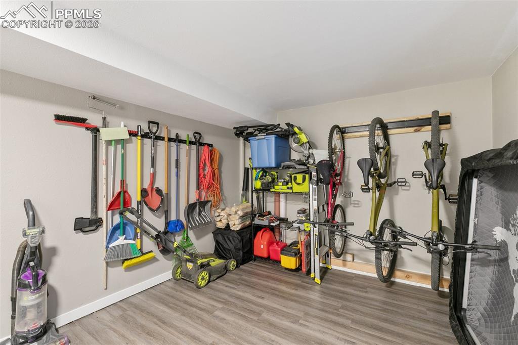 Image 32 of 39: Main level large mudroom and laundry with ample room for storage