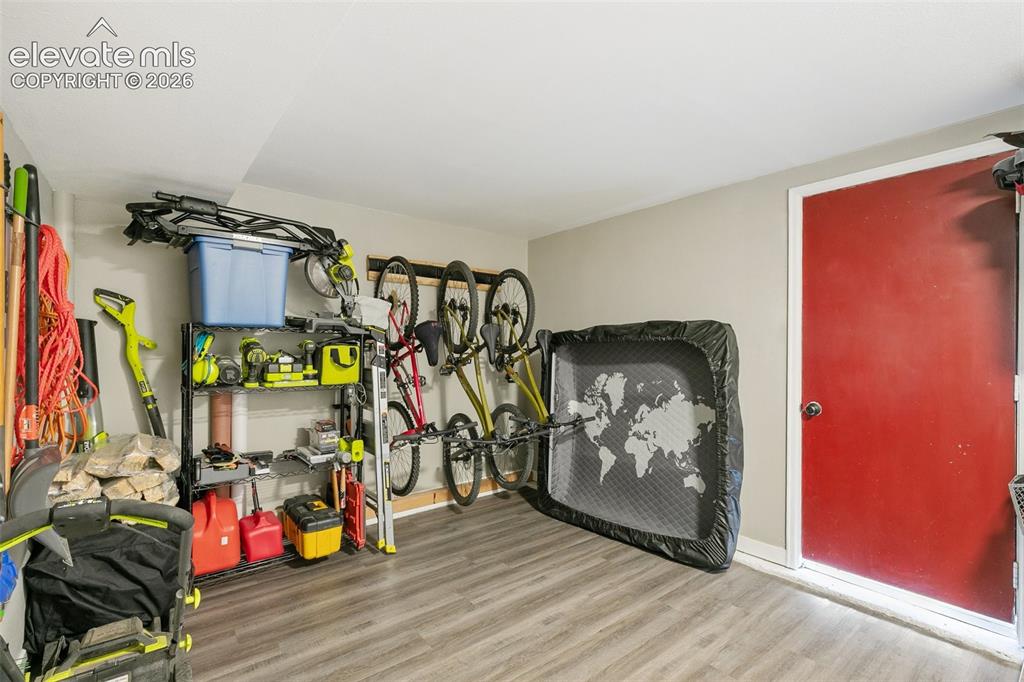 Image 32 of 39: Main level large mudroom and laundry with ample room for storage