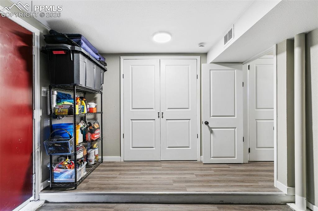 Image 33 of 39: Main level mud room and laundry