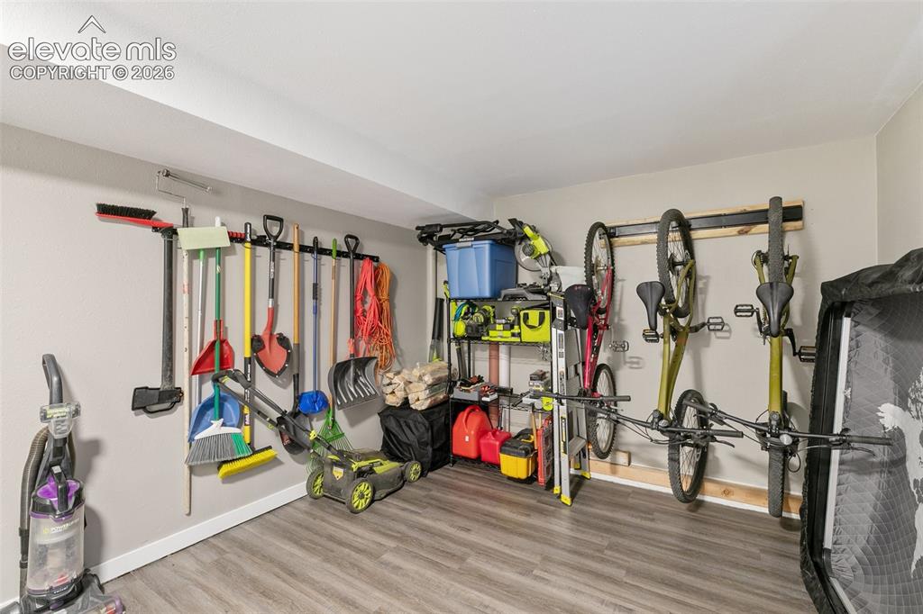 Image 33 of 39: Main level large mudroom and laundry with ample room for storage