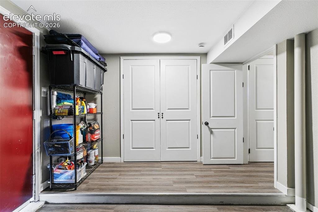 Image 34 of 39: Main level mud room and laundry