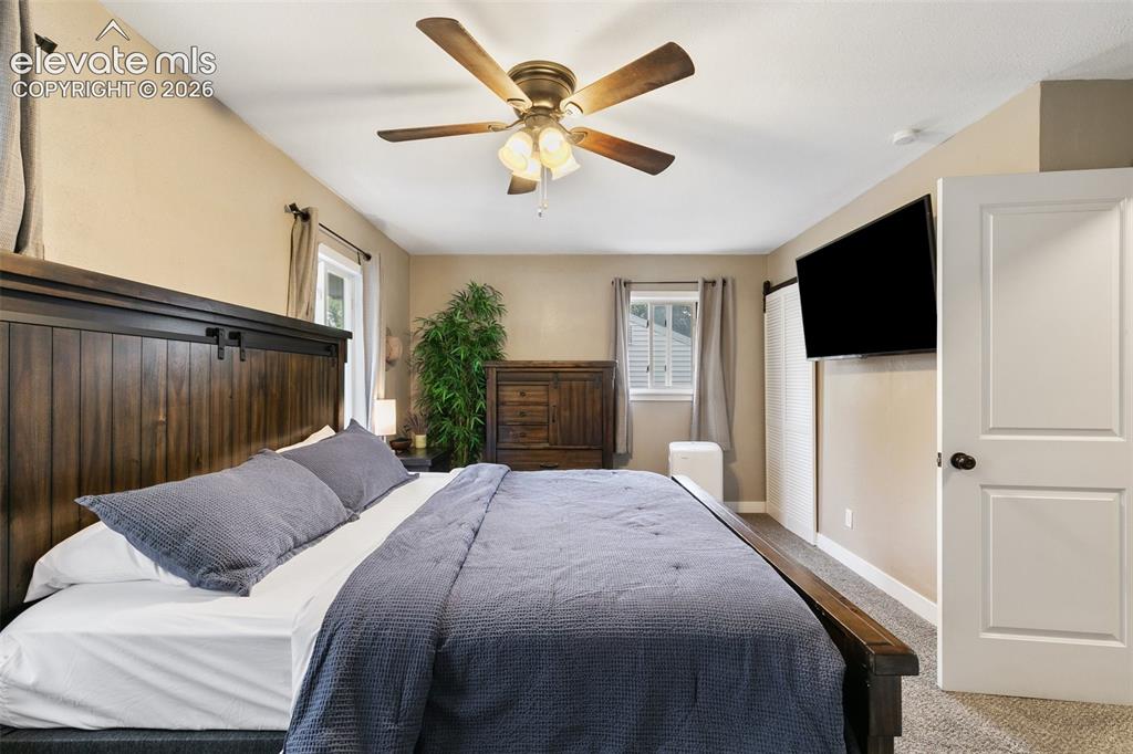 Image 4 of 39: Large primary bedroom with extra room to spread out, and 2 large closets.
