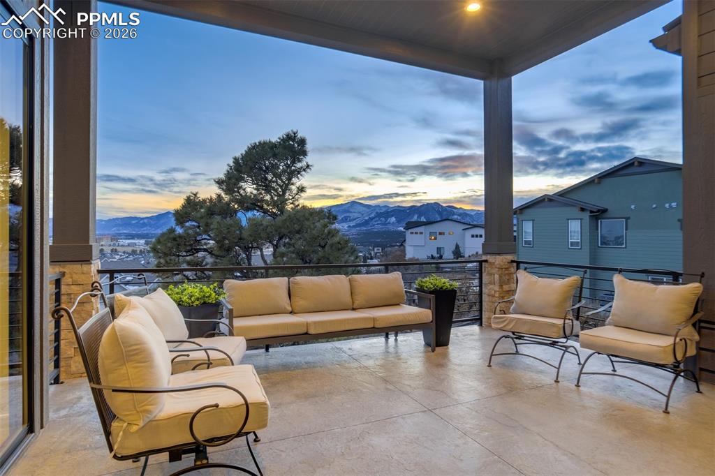 Image 11 of 50: Main level covered deck