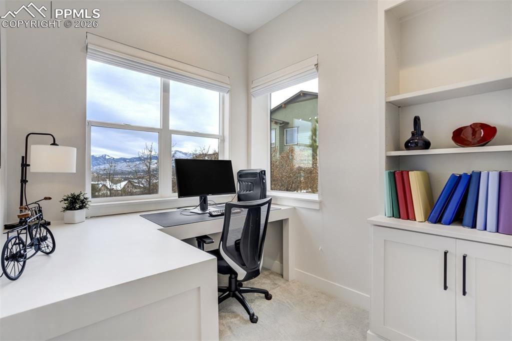 Image 26 of 50: Basement pocket office w/built-ins