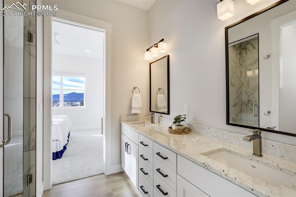 Image 43 of 50: In-Law/Secondary Suite En-suite 3/4 Bathroom w/walk-in closet