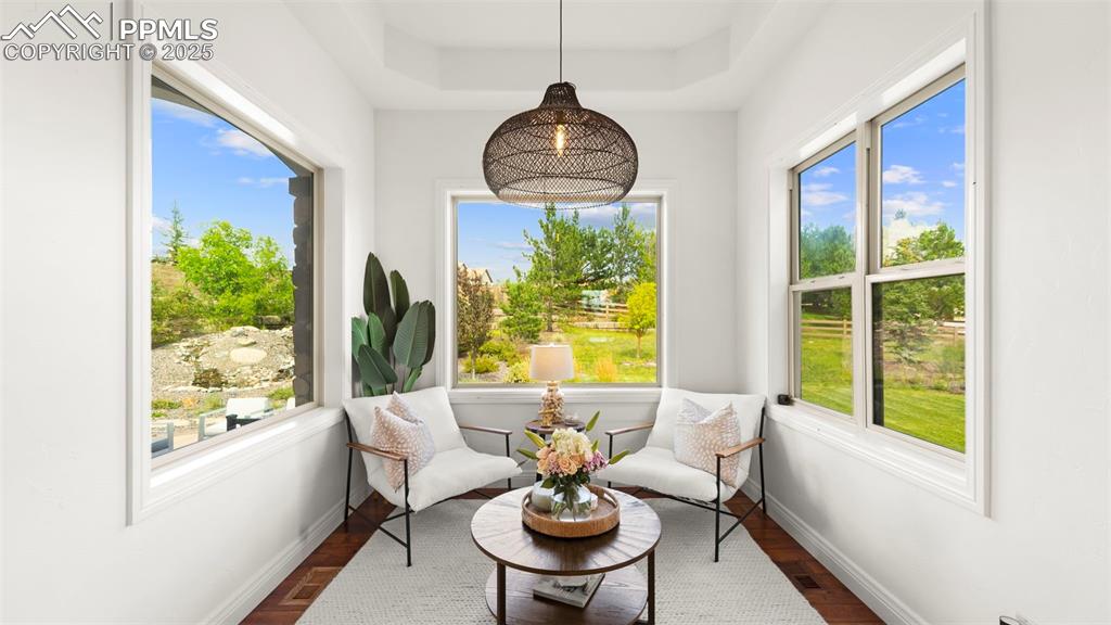 Image 13 of 50: Sunroom with healthy amount of natural light