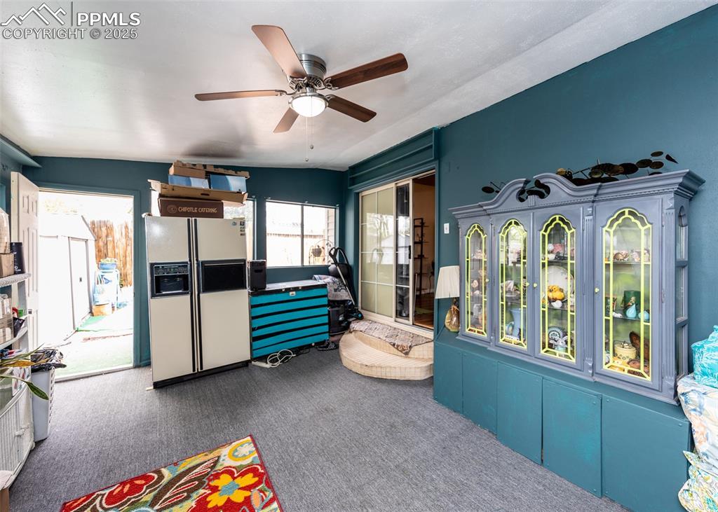 Image 25 of 42: Recreation room featuring carpet and a ceiling fan