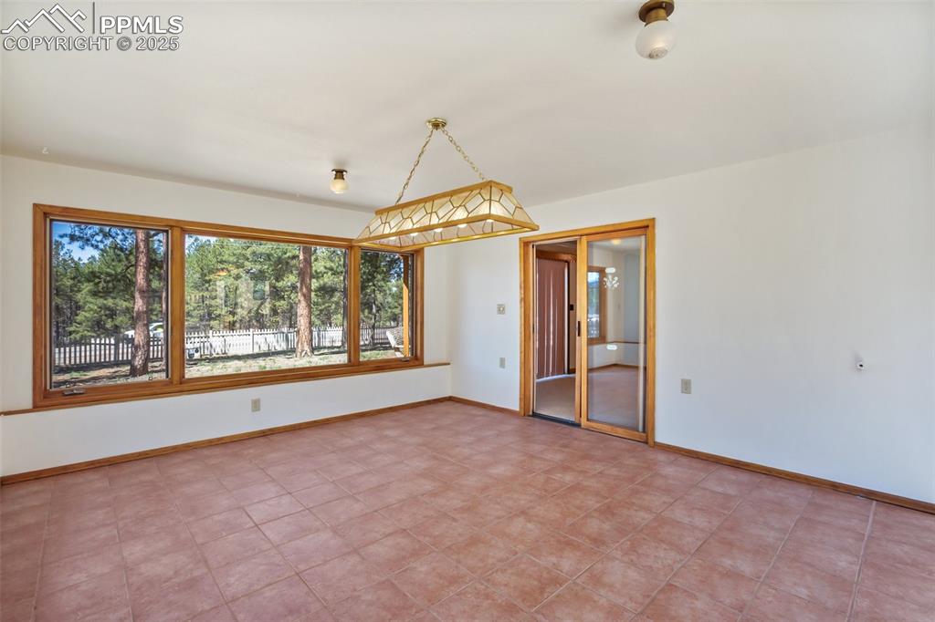 Image 18 of 36: Unfurnished room with baseboards