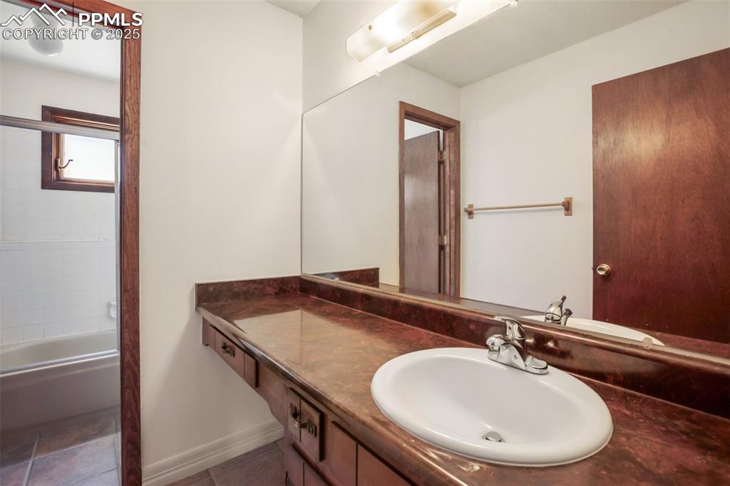 Image 23 of 36: Lower level full bath