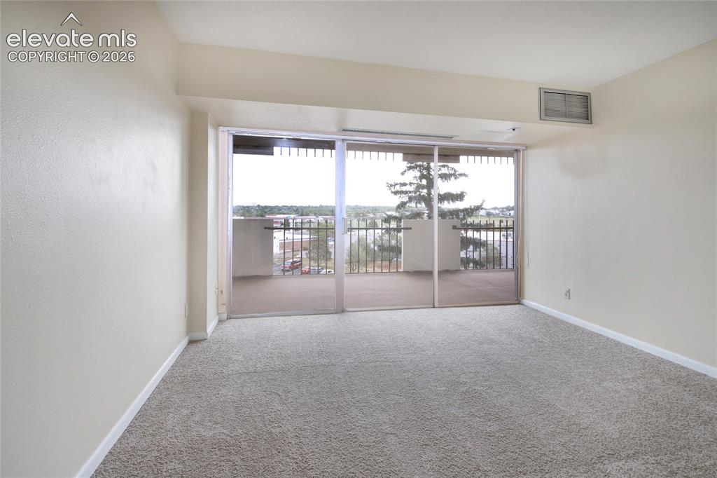 Image 15 of 33: Easy access to the covered balcony