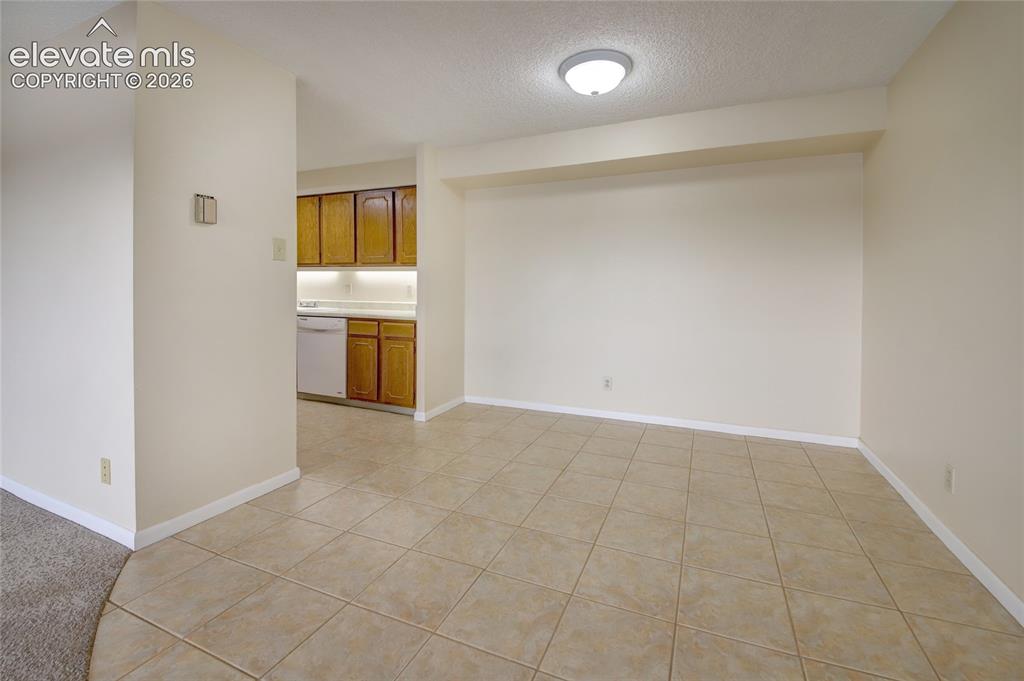 Image 17 of 33: Open Dining Room off the kitchen and Living Room.