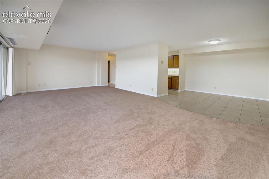 Image 22 of 33: Living and Dining rooms