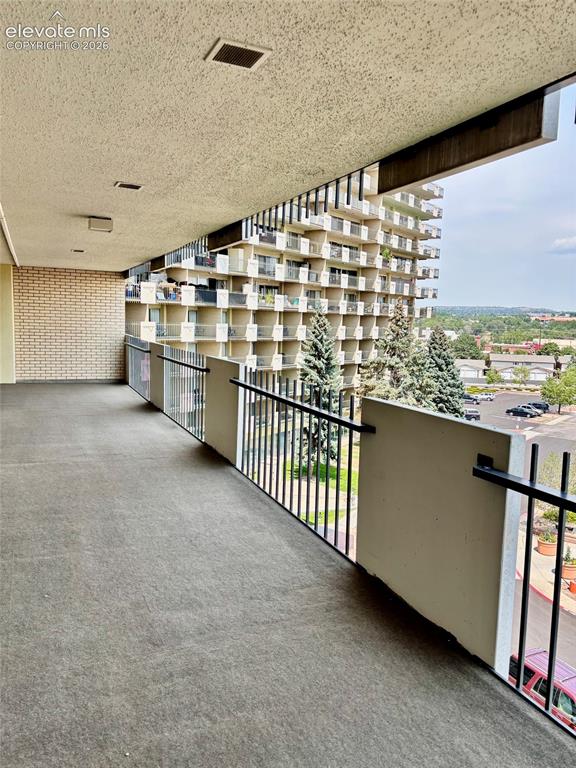 Image 8 of 24: Expansive Covered Balcony