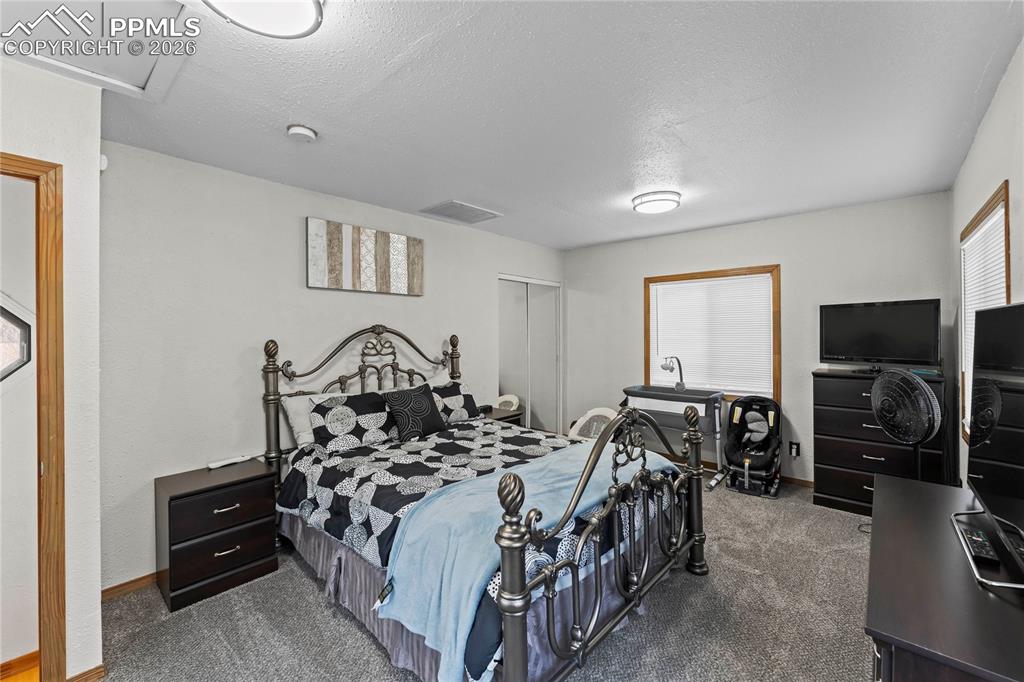 Image 19 of 38: Bedroom