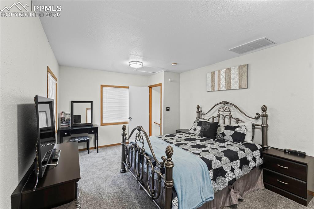 Image 21 of 38: Bedroom